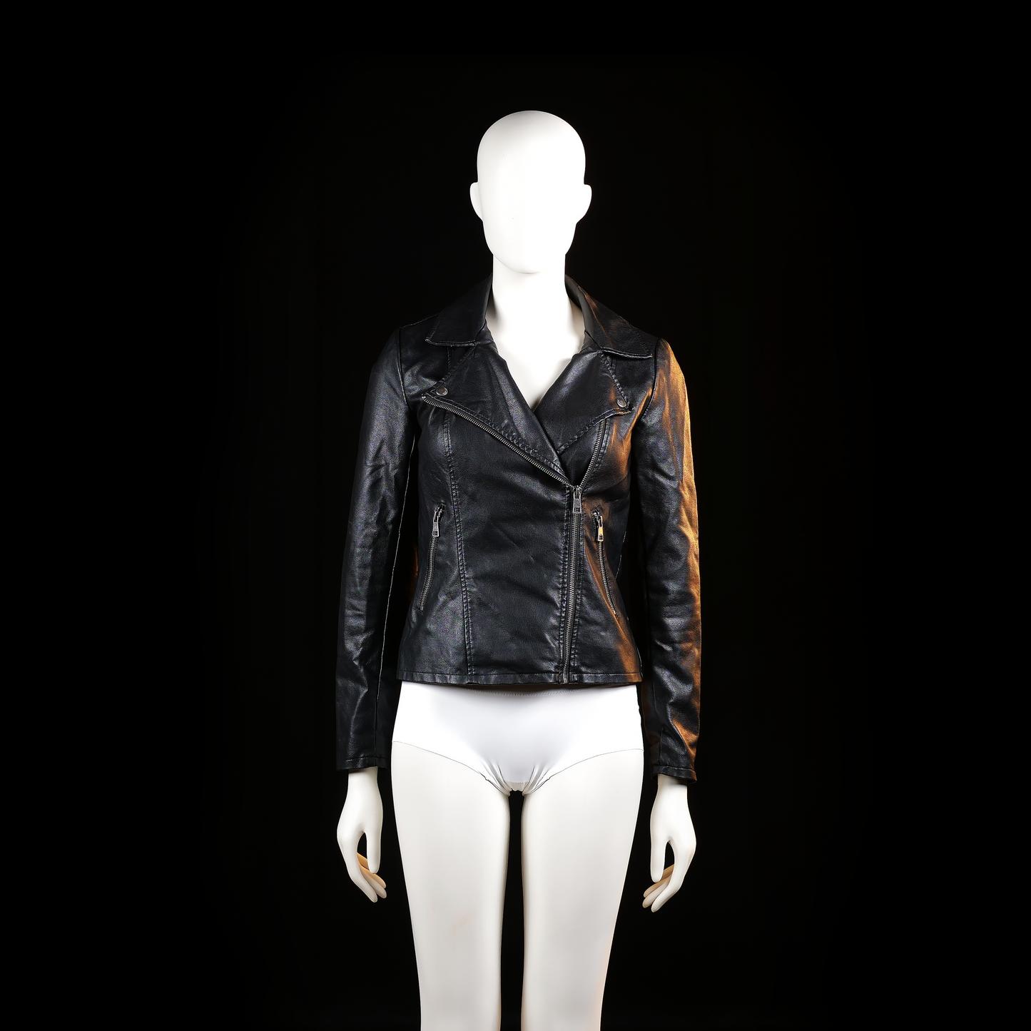 Only - Biker jacket - Black - Size XS - Black jacket with an asymmetrical front zipper, wide lapels, and zippered side pockets. Form-fitting structure with visible seam lines on front and back.