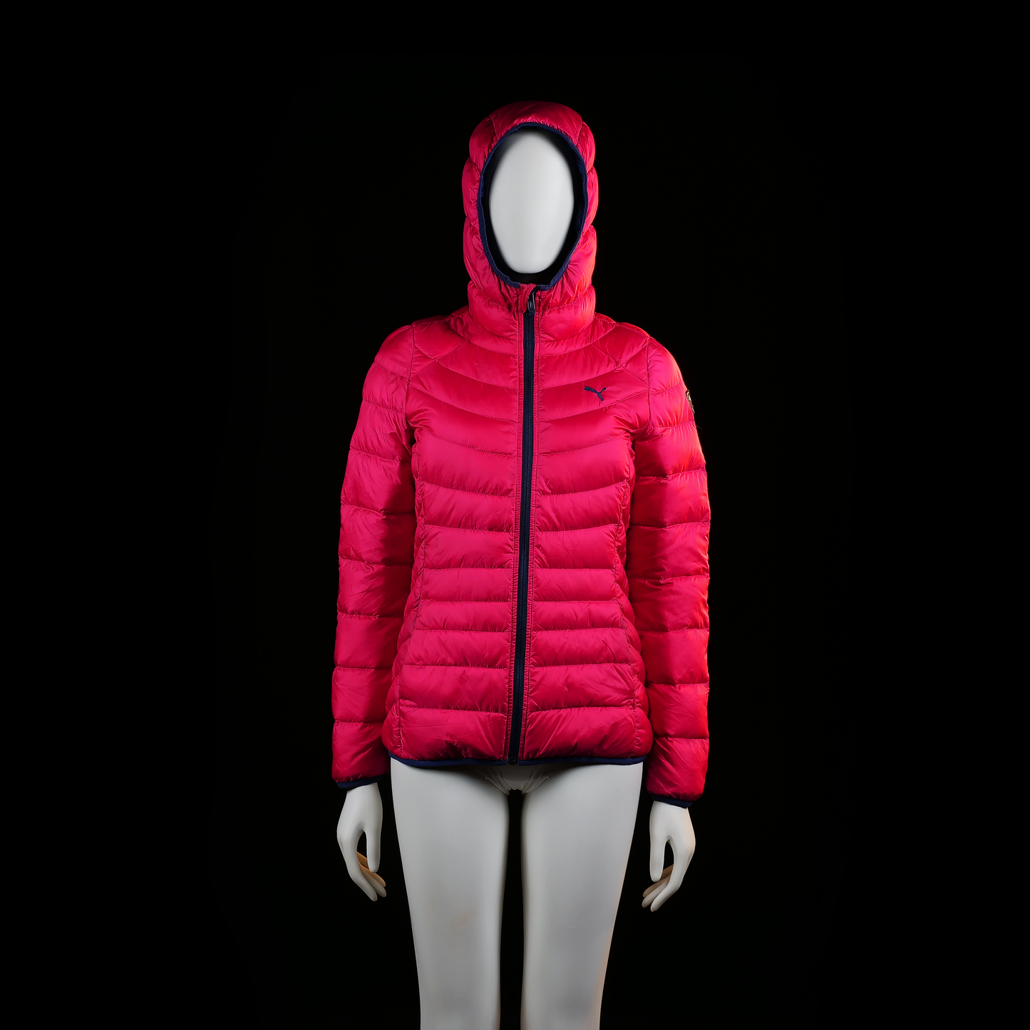 Puma - Padded jacket - Pink & Black - Size 36 - Bright pink quilted jacket with horizontal stitching, zip closure, and hood. Dark trim appears along the zipper, cuffs, and hood lining.