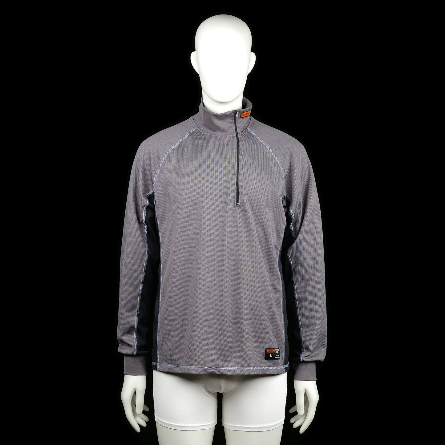 Jobman - Sports top - Gray & Black - Size L - Gray long-sleeve sports top with ribbed cuffs, black side panels, and a mock neck with a short front zipper. Contrast stitching runs along the shoulders and sides.