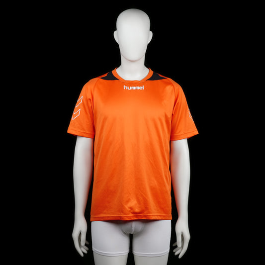 Hummel - Sports top - Orange & Black - Size M - Orange sports top with black shoulder accents and white printed arrows on the sleeves. Features a round neckline and straight hem.